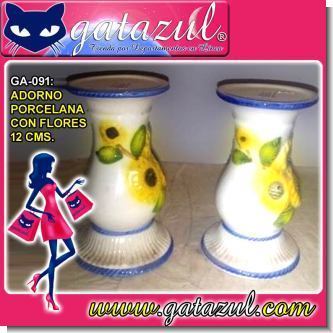 Lee el articulo completo ADORNO DE PORCELANA EN FORMA DE PEDESTAL CON FLORES EN RELIEVE 12 CENTIMETROS DE ALTURA